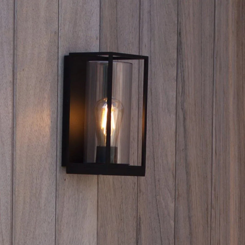 Lutec Flair cuboid wall lantern fixed to a wooden exterior wall